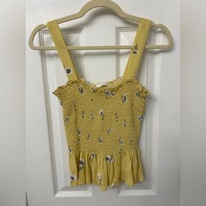 Yellow peplum tank top
